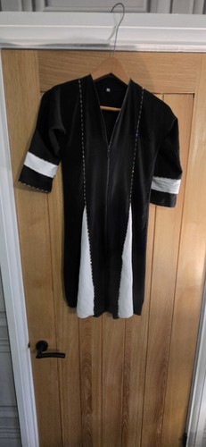 Black dress tunic featuring - black,